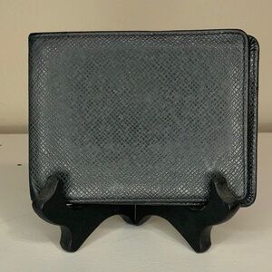 Louis Vuitton Taiga Bifold Wallet in Black Grained Leather (4.5" x 3.5")